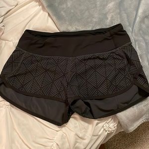 Black Lululemon shorts with design